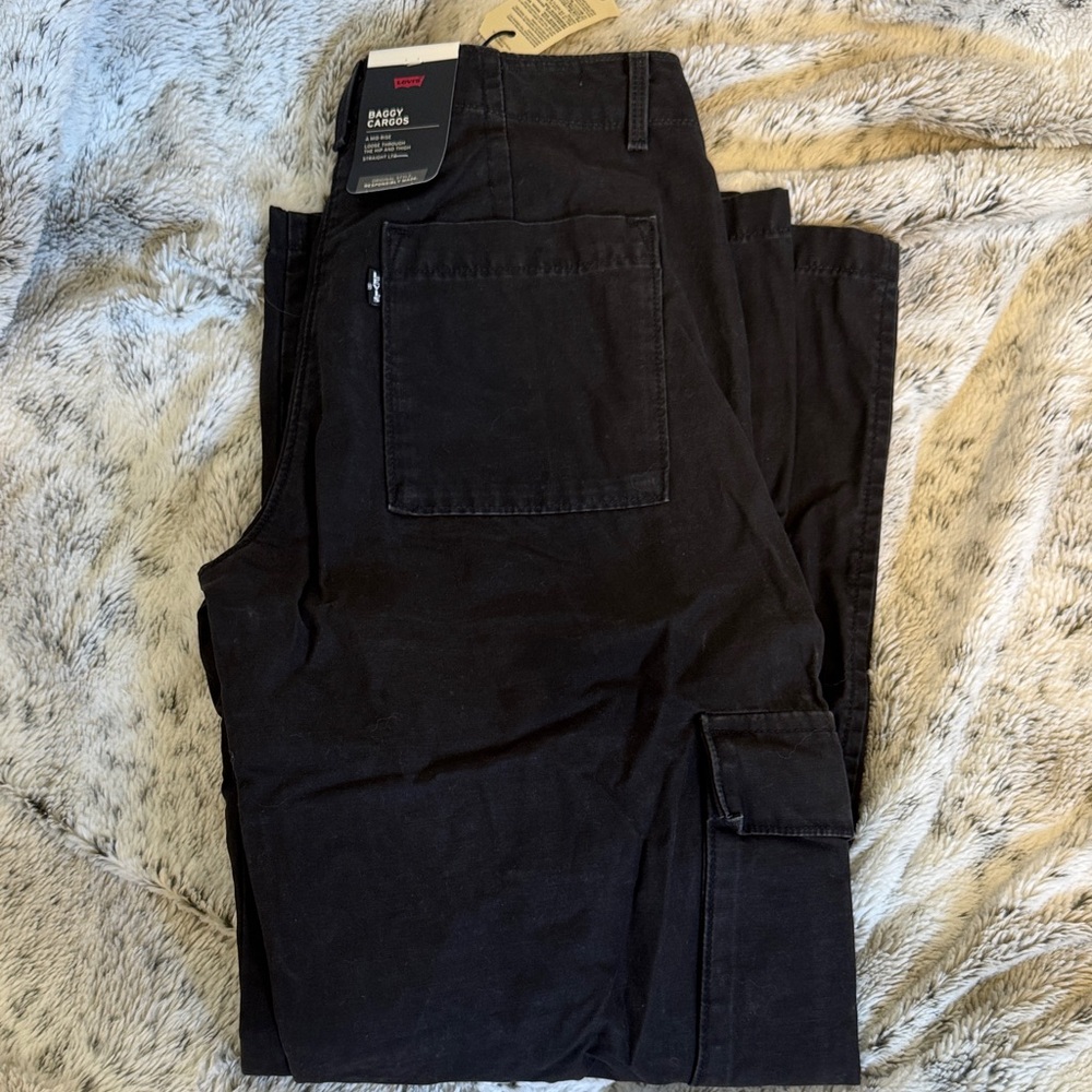 Levi's Black Baggy Cargos a mid rise loose through the hip and thigh straight